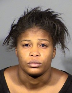 Aisha Thomas is seen in a booking photo released by Las Vegas police. 