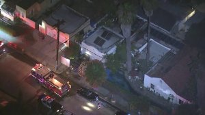 An image from Sky5 shows firefighters on the scene of a structure fire in Santa Ana on Aug. 17, 2018. (Credit: KTLA)