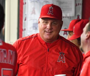 Manager Mike Scioscia of the Los Angeles Angels of Anaheim in the dugout during the game against the Seattle Mariners at Angel Stadium on September 13, 2018 in Anaheim. (Credit: Jayne Kamin-Oncea/Getty Images)