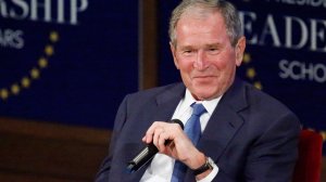 Former U.S. President George W. Bush responds with a smile after making a joke while answering a question at the Presidential Leadership Scholars graduation ceremony at the George W. Bush Institute on July 13, 2017, in Dallas, Texas. (Credit: Stewart F. House/Getty Images)