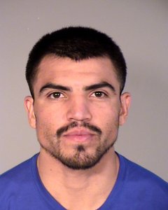 Victor Ortiz, 31, is seen in a booking photo released by Oxnard police on Sept. 25, 2018.