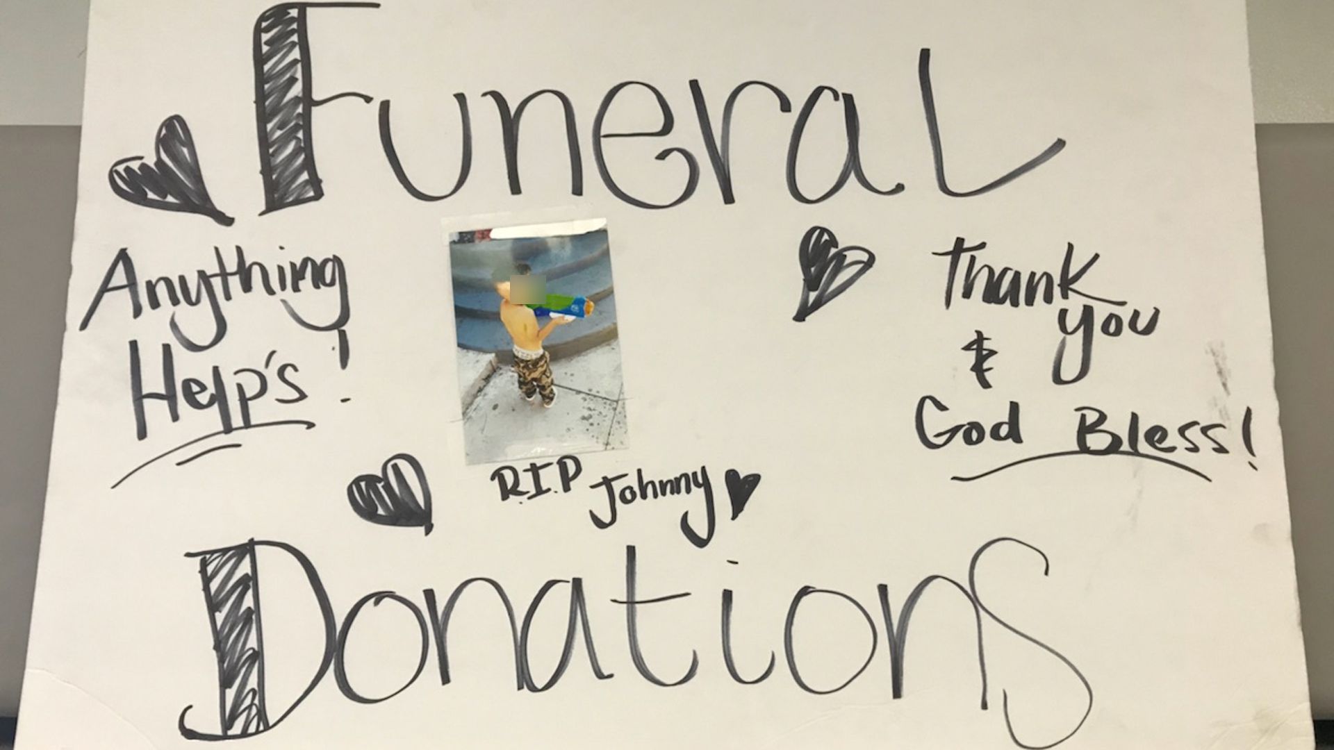 One of the donation signs is seen in an image provided by the San Bernardino County Sheriff's Department.