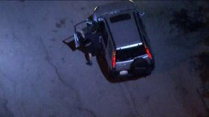 The suspect in a chase in North Hollywood on Oct. 1, 2018, appears to carjack someone just moments before the pursuit came to an end. (Credit: KTLA)