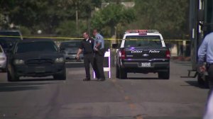 Police investigate a homicide in Colton on Oct. 23, 2018. (Credit: KTLA)