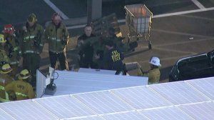 Federal and local authorities respond to a suspicious package – addressed to Rep. Maxine Waters – at a South L.A. mail facility on Oct. 24, 2018. (Credit: KTLA)