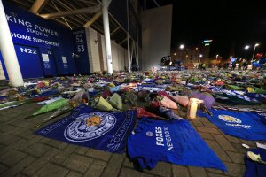 Tributes are seen as mourners pause to pay tributes after the helicopter crash at The King Power Stadium on Oct. 28, 2018 in Leicester, England.(Credit: Stephen Pond/Getty Images)