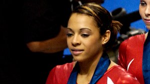 Tasha Schwikert is seen while completing as a U.S. gymnast in 2003. (Credit: Tim De Waele/Getty Images)