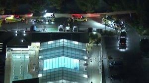 Paramedics and first responders go through the scene of an incident of pool chemical exposure in Thousand Oaks on Oct. 3, 2018, that left 20 people hospitalized, with seven suffering critical injuries. (Credit: KTLA)