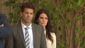 Grant Robicheaux and Cerissa Riley look on as their attorneys speak outside a Newport Beach courthouse on Oct. 17, 2018. (Credit: KTLA)