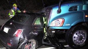 California Highway Patrol officers investigate the scene of a fatal collision on the southbound 405 Freeway near Harbor Boulevard on Nov. 22, 2018.