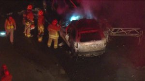 Two people died in a fiery crash involving an SUV and a big rig on the 5 Freeway in Santa Clarita on Nov. 1, 2018. 