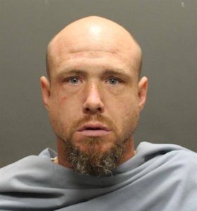 David James Bohart is seen in a booking photo released by Tucson police. 