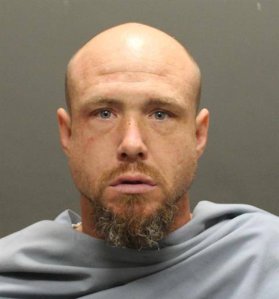 David James Bohart is seen in a booking photo released by Tucson police.