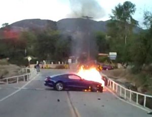 A man out walking his dog rescued an unconscious woman from a burning car wreck in San Dimas on Nov. 1, 2018. (Credit: Los Angeles County Sheriff's Department)
