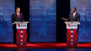 Republican Ron DeSantis (left) and Democrat Andrew Gillum (right) debate at Broward College on Oct. 24, 2018, in Davie, Florida. (Credit: Wilfredo Lee-Pool/Getty Images)