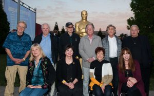 Art Rochester, Candy Clark, Fred Roos, Haskell Wexler, Cindy Williams, Willard Huyck, Gloria Katz, Ed Greenberg, Mackenzie Phillips and Bo Hopkins attends The Academy Of Motion Picture Arts And Sciences' Oscars Outdoors Screening Of 'American Graffiti' on August 2, 2013 in Hollywood. (Credit: Valerie Macon/Getty Images)