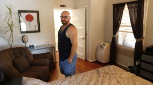 Marc Bochner, who lives in one of the apartments in the Westlake triplex that he owns, argues it would be unfair to ban him from hosting short-term rentals in his home just because his apartment falls under the Rent Stabilization Ordinance. (Credit: Mel Melcon/Los Angeles Times)