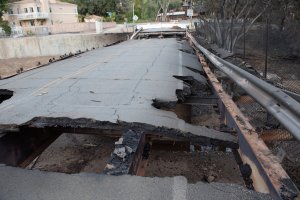 A roadway damaged and left impassable after the Woolsey Fire is seen in a photo released by the Los Angeles County Sheriff's Department on Nov. 15, 2018.