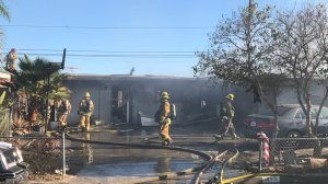 Ventura County firefighters work at the scene of a house fire in the El Rio neighborhood on Nov. 24, 2018. (Credit: Ventura County Fire Department)