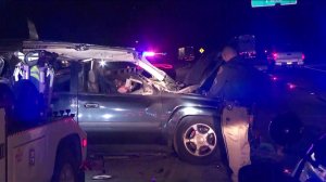 California Highway Patrol officers investigate the scene of an injury crash on the westbound 210 Freeway near Yarnell Street in Sylmar on Dec. 2, 2018.