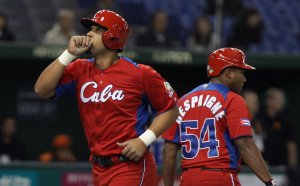 Jose Abreu # 79 of Cuba celebrates after hits a solo home run in the fourth inning during the World Baseball Classic Second Round Pool 1 game between Cuba and the Netherlands at Tokyo Dome on March 11, 2013 in Tokyo, Japan. (Credit: Chung Sung-Jun/Getty Images)