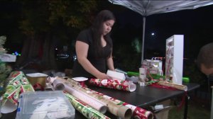 A Burbank mother has taken to gift wrapping as a way to keep her mind occupied, as well as to raise some extra money to help the family make ends meet as her son battles cancer.