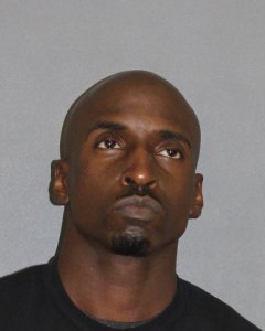 Emanuel Demar Banks, 38, is seen in a booking photo released Dec. 11, 2018, by Irvine police.