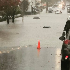 Water submerges cars at 17th Street and Pomona Avenue in Costa Mesa during a storm on Dec. 6, 2018. (Credit: Costa Mesa Police Department)