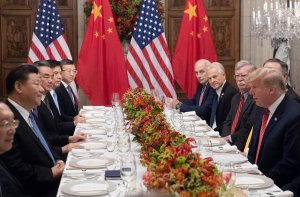 US President Donald Trump (R) and China's President Xi Jinping (L) along with members of their delegations, hold a dinner meeting at the end of the G20 Leaders' Summit in Buenos Aires, on December 01, 2018. (Credit: Saul Loeb/AFP/Getty Images)