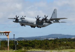 This photo taken on July 15, 2014 shows a U.S. Marine KC-130 air refuelling tanker taking-off at the Futenma air base in Okinawa, Japan. (Credit: AFP / Getty Images)