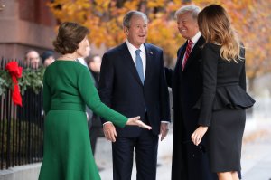 Former first lady Laura Bush and former President George W. Bush greet President Donald Trump and first lady Melania Trump outside of Blair House Dec. 4, 2018, in Washington, D.C. (Credit: Chip Somodevilla/Getty Images)
