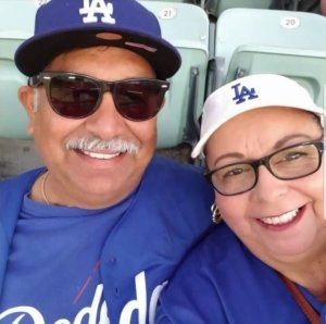Joel Perales is seen with his wife in an undated photo provided by the family.