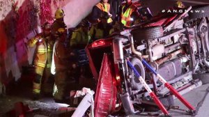 A vehicle overturned in a four-vehicle crash on the 22 Freeway in Garden Grove on Jan. 1, 2019. (Credit: AMGNews)