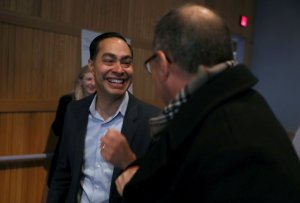 Former U.S. Secretary of Housing and Urban Development Julian Castro talks with an attendee during the Clark County Democrats' Steering Committee Meeting at Sierra Vista High School on Jan. 08, 2019, in Las Vegas, Nevada. (Credit: Justin Sullivan/Getty Images)