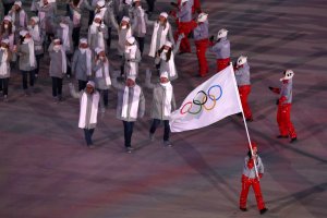 Russian athletes enter the stadium during the Opening Ceremony of the 2018 Winter Olympic Games under the Olympic flag, after Russia was officially banned from participating in the games in Pyeongchang-gun, South Korea.  (Credit: Dean Mouhtaropoulos/Getty Images)