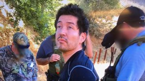 Anthony Rauda is seen being taken into custody in a remote area of Malibu Creek State Park on Oct. 10, 2018, in an image released by the Los Angeles County Sheriff's Department.