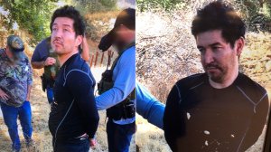 Anthony Rauda is seen being taken into custody in a remote area of Malibu Creek State Park on Oct. 10, 2018, in images released by the Los Angeles County Sheriff's Department.