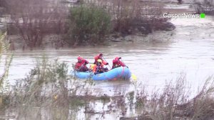 First responders are seen making rescues from the flooding Santa Clara River in the Jurupa Valley on Jan. 17, 2019. (Credit: Casper News)