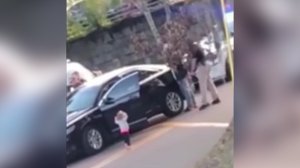 The Tallahassee Police Department shared this photo of a barefoot toddler holding up her hands as her father was pulled over for a traffic stop on Jan. 17, 2019. 