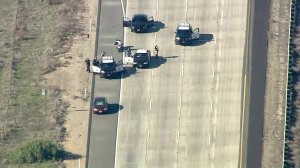 A driver leading authorities on a multicounty pursuit stops on the 5 Freeway in Camp Pendleton on Jan. 3, 2019. (Credit: KTLA)