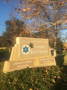 A swastika is seen spray-paint on a sign at the Temple Beth Torah in a photo provided by Ventura police on Jan. 4, 2019.