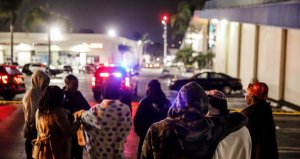 People wait for word on the victims after a fatal shooting occurred at the Gable House Bowl bowling alley in Torrance on Jan. 4, 2019. (Credit: Marcus Yam / Los Angeles Times)