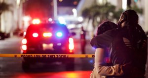 People console each other outside the Gable House Bowl bowling alley in Torrance after a fatal shooting occurred on Jan. 4, 2019. (Credit: Marcus Yam / Los Angeles Times)