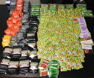 The Santa Barbara County Sheriff's Department seized about $60,000 worth of marijuana products, $7,600 in cash, and two unlicensed firearms involved in an illegal cannabis delivery service on Friday. (Credit: Santa Barbara County Sheriff's Department)