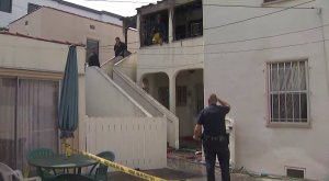 Officials investigate a fire that killed a 91-year-old man in the Pico-Robertson area on Feb. 26, 2019. (Credit: KTLA)