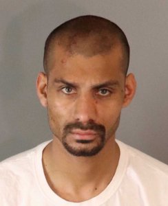 Hugo Cesar Garciao, 32, of Moreno Valley, pictured in a photo released by the Riverside Police Department following his arrest on Feb. 16, 2019.