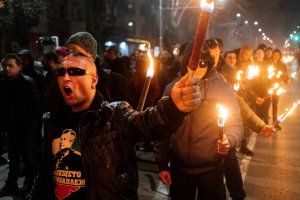 Members of nationalist organizations parade with torches during a march to commemorate Bulgarian General and politician Hristo Lukov, in the centre of Sofia on February 16, 2019. (Credit: DIMITAR DILKOFF/AFP/Getty Images)