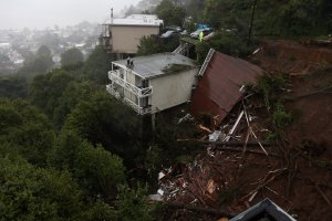 A view of the roof of a home that was swept down a hill by a mudslide during a rain storm on February 14, 2019 in Sausalito, California. (Credit: Justin Sullivan/Getty Images)