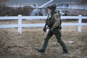 Police secure the area following a shooting at the Henry Pratt Co. plant in Aurora, Illinois, on Feb. 15, 2019. (Credit: Scott Olson / Getty Images)