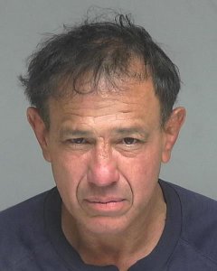 Jonny Knowles, 56, is seen in a booking photo released Feb. 6, 2019, by the Garden Grove Police Department.